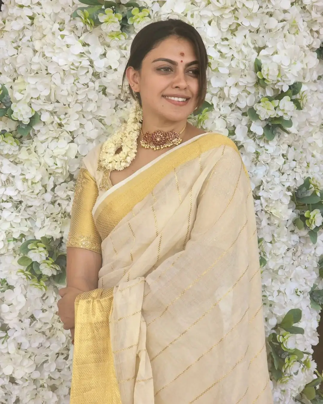 Anusree Nair Wearing Beautiful Earrings Jewellery White Pattu Saree